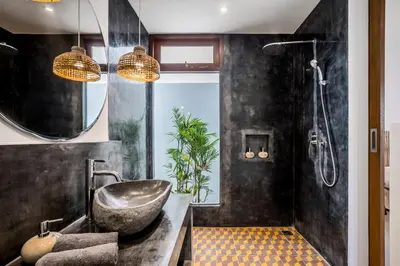 a bathroom with a large sink and a shower at Villa Mimpi Seminyak by Alfred in Bali in Seminyak