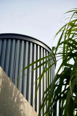 a close up of a building with a plant at Adamare Villa Umalas in Kerobokan