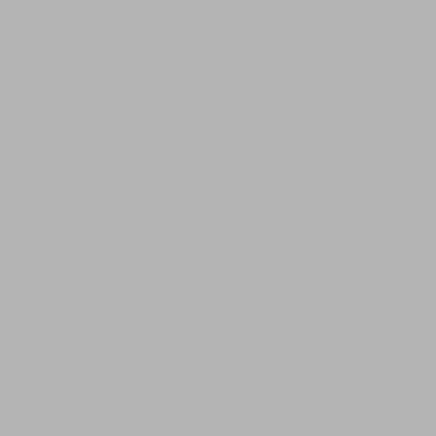 a living room with a couch and a table with a laptop at Villa Sinergi Seminyak 2 in Seminyak