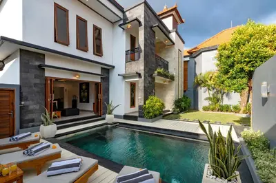 a swimming pool in the backyard of a house at Vast 5bd Villa with Garden and Private Pool 250m to Beach in Seminyak