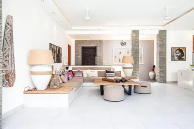 a living room with a couch and a table at Luxurious 6 Br in Canggu 400m to Finns Beach in Canggu