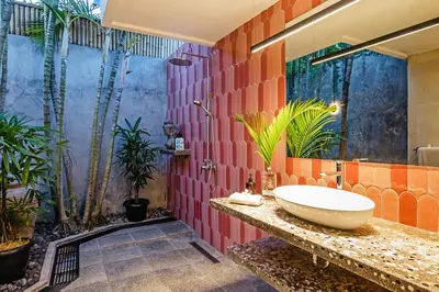 a bathroom with a sink and some plants at Baliani Beauty in Seminyak